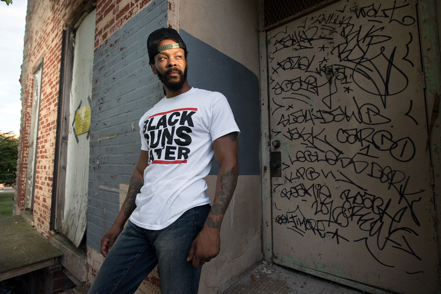 Black Guns Matter founder Maj Toure is shown in a housing project in Baltimore.