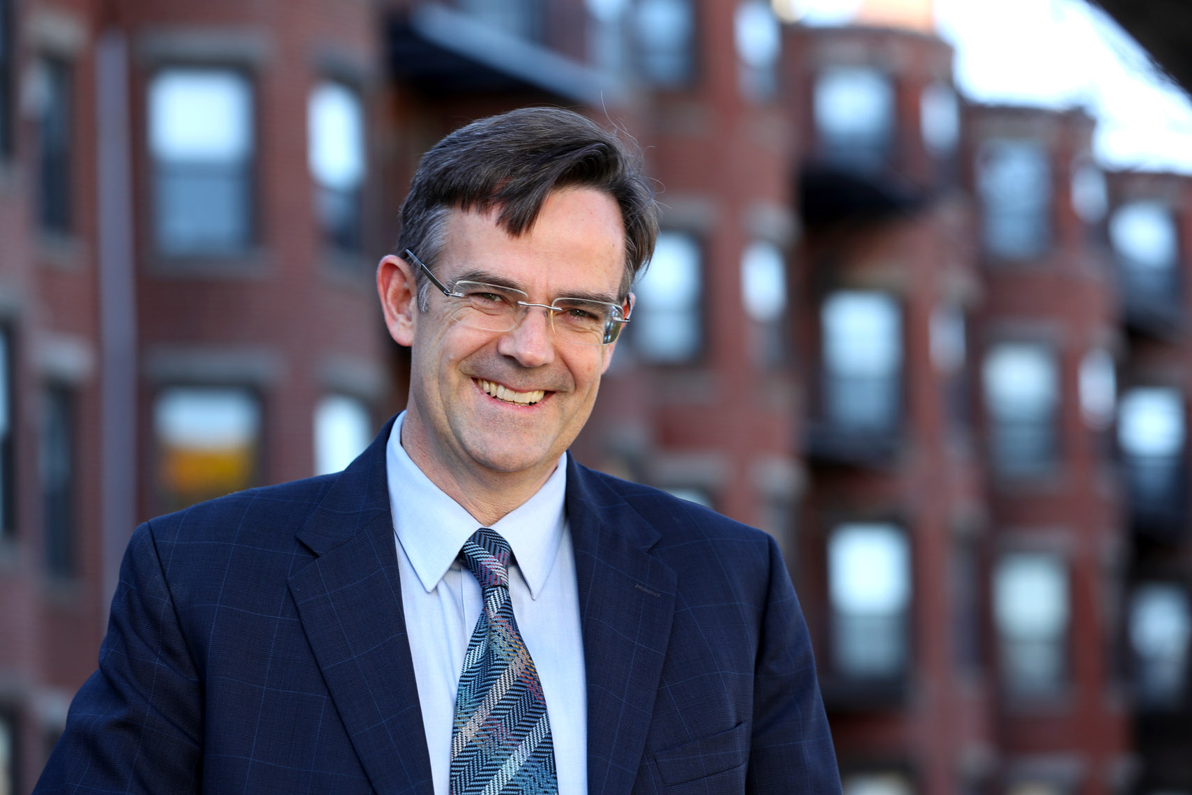Boston University Senior dean Paul Carlile poses for a portrait on campus.