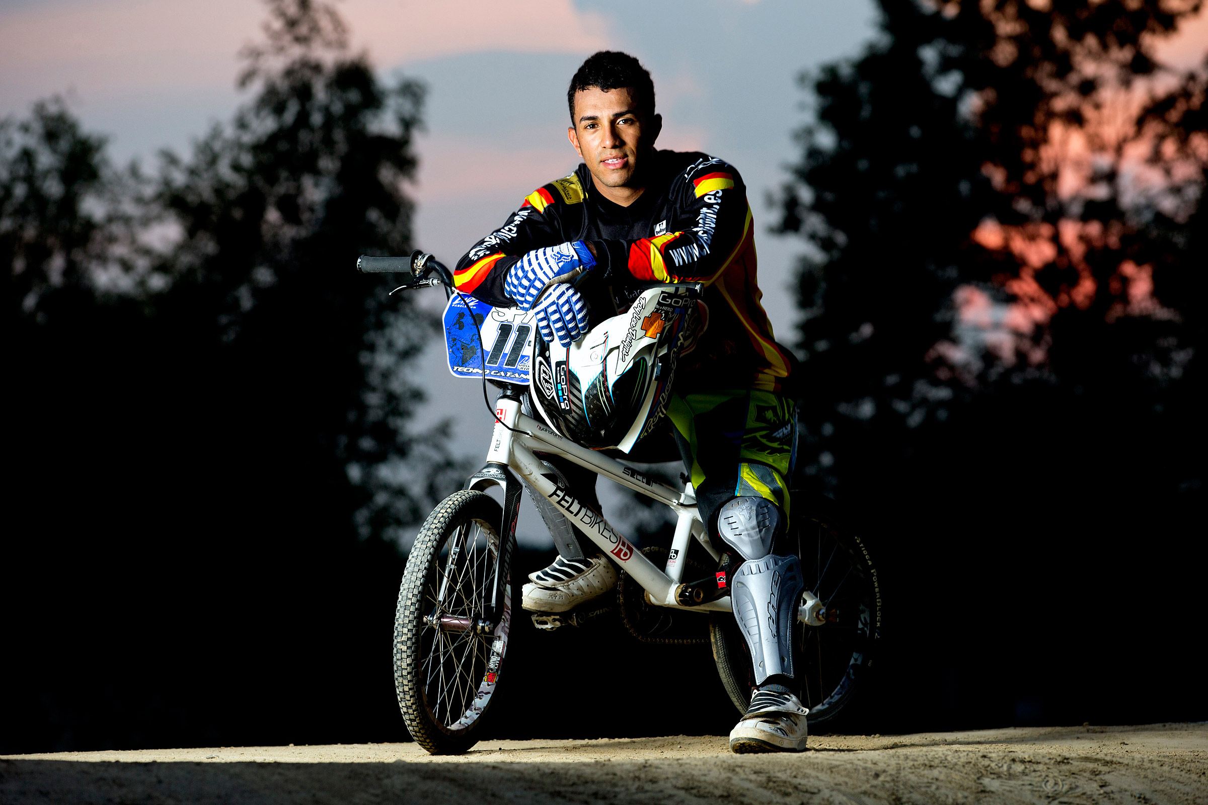A multi colored sky backgrounds BMX biker Jose Catano
